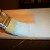 I used a 2-1/2" straight brush designed for all paints. Dip into the paint just an inch. Unload the brush onto the surface, painting with the grain. I used a 2-1/2" straight brush designed for all paints. Dip into the paint just an inch. Unload the brush onto the surface, painting with the grain.
