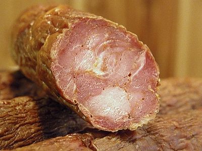 Cajun andouille is made of butt or shank meat &amp; fat, seasoned w/ salt, cracked black pepper, garlic, &amp; smoked over pecan wood &amp;