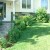 I lined my stairs and the front of my house with hosta and other perennials. I lined my stairs and the front of my house with hosta and other perennials.