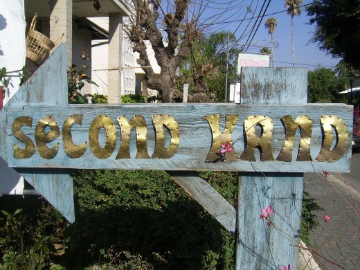 If you don't mind buying used goods, second hand stores offer a way around buying imported goods.