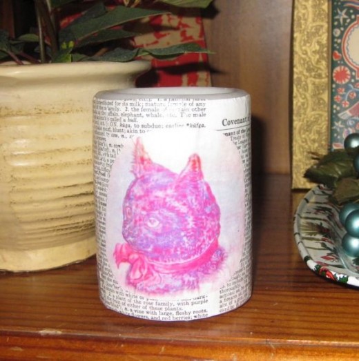 Use dictionary pages plus other clip art to decorate flameless candles.