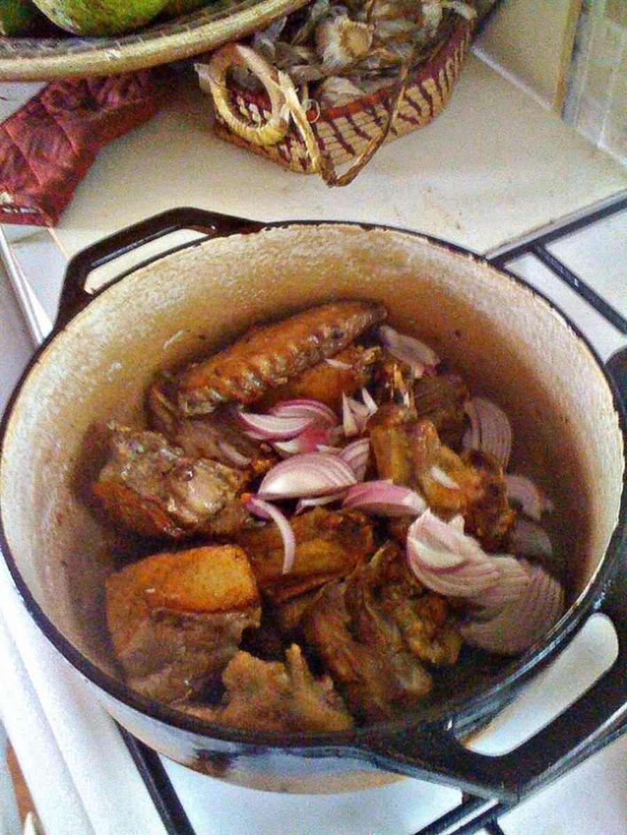 Add the browned meat back to the dutch oven, let heat up then add the sliced onion.