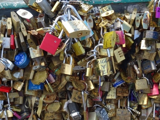 Love-locks on the bridge now come in layers - a massive burden for the bridges to bear - too much love in Paris.