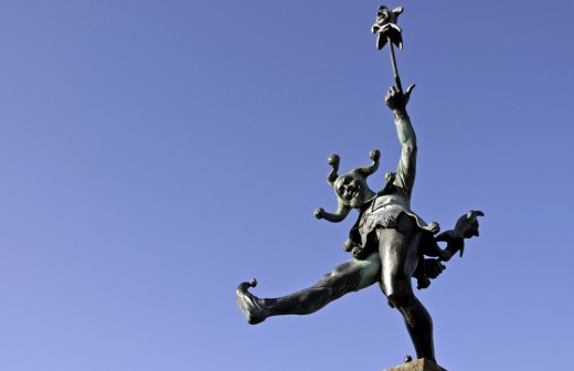 The statue of the jester erected high on the streets of Stradford.