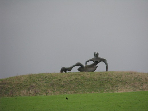 Large Reclining Figure (in the distance) by Henry Moore