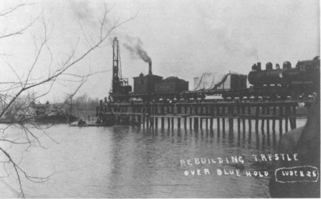 Pile driver rebuilding the Blue Hole Trestle