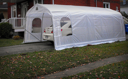 A temporary carport can be the perfect solution if you are short on funds or plan to move shortly.