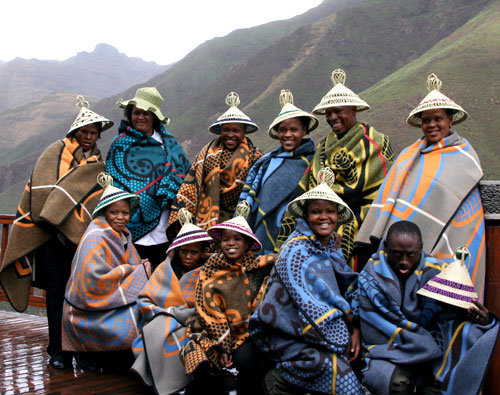 Lesotho, which shares a border with South Africa is famous for its mountains.  It can be cold up there so, pack t-shirts you can use as vests.  Roads are beautiful but get a driver so that you can enjoy the countryside.