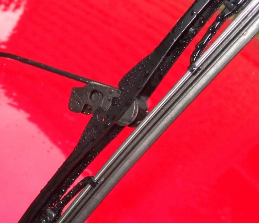 Another close-up of windshield wiper and attachment point. Another close-up of windshield wiper and attachment point.