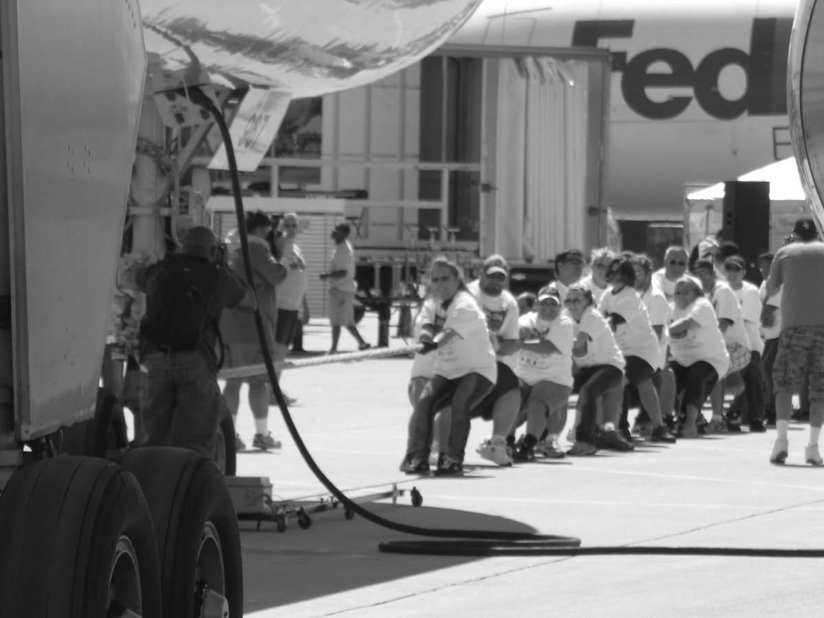 A team pulls a plane at the 2013 Plane Pull, Dulles IAP, VA.