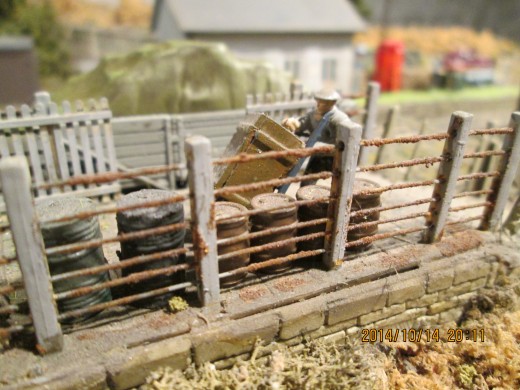 At Ayton Lane's erstwhile cattle/sheep dock a porter heaves a barrow with a heavy crate to be collected by the next outward wagons or vans 