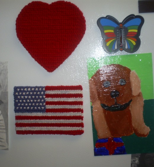 Make a Fourth of July cross stitched magnet.