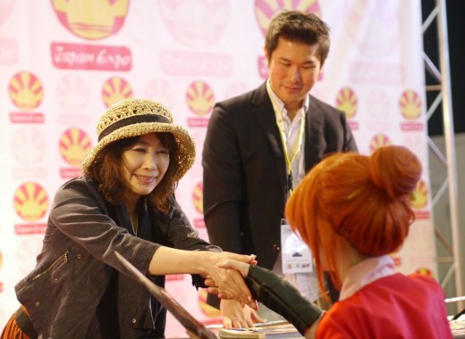 Junko Takeuchi greeting her fans at Japan Expo 2013 in Paris.