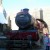 The Hogwarts Express waiting for people to climb on board. The Hogwarts Express waiting for people to climb on board.