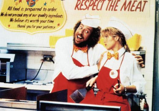 Mr. Egg (Frank Dent) loves his job as he trains not-so thrilled Christina Applegate in Don't Tell Mom the Babysitter's Dead