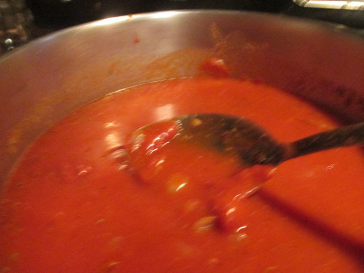 Tripe cooking in tomato sauce