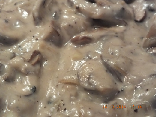 Add your cream of mushroom soup and stir to incorporate all the ingredients.