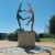 Klerksdorp's emblem: A man and a woman representing the main economy of the district - gold mining and agriculture.  