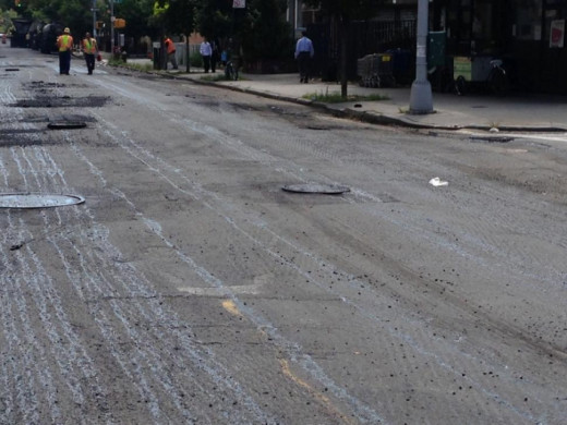 This is an example of a torn up street waiting to be repaved.