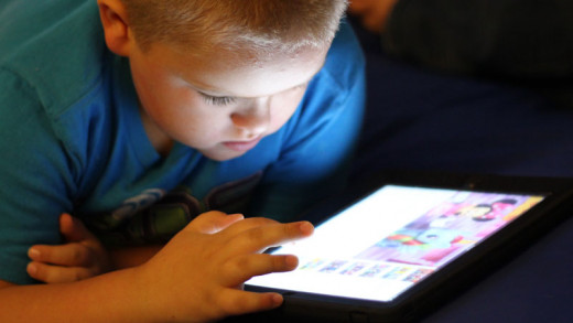 My Nephew Enjoying his Tablet