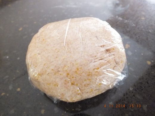 I then drop the dough on a sil-pat and kneed into a nice tight ball.  Now it's ready to wrap up in plastic wrap. Leave it in the refrigerator for at least 30 minutes.