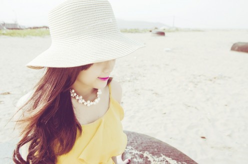 Woman in sun: Aspirin helps to treat the appearance of sun spots and age spots.  