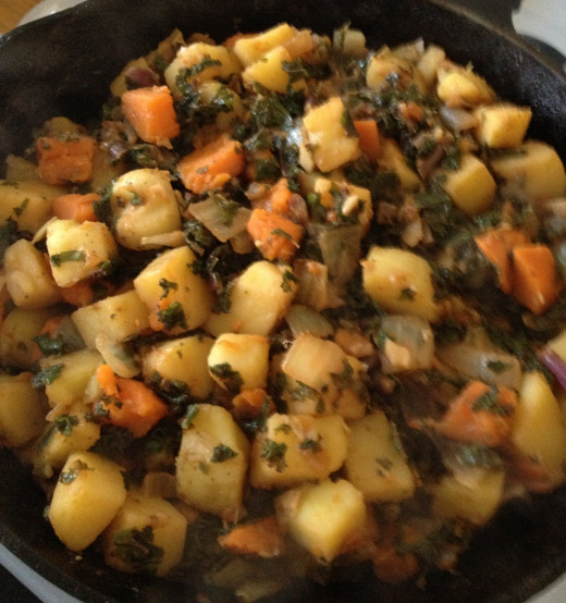 Pommes de terres with kale and yams, ready to serve rustic-style, in my cast iron skillet