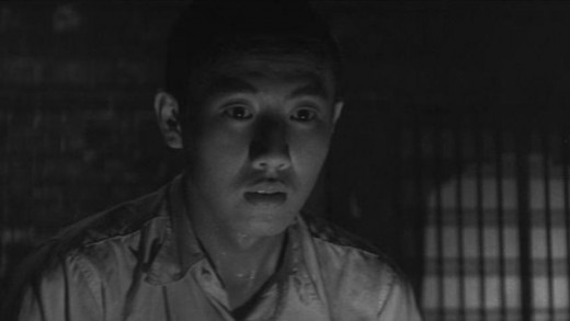 The acolyte (Raizō Ichikawa) contemplates his private hell in Kon Ichikawa's Conflagration (1958)