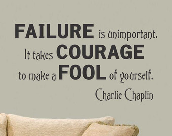"Failure is unimportant. It takes courage to make a fool of yourself." Charlie Chaplin saying stencil on a wall