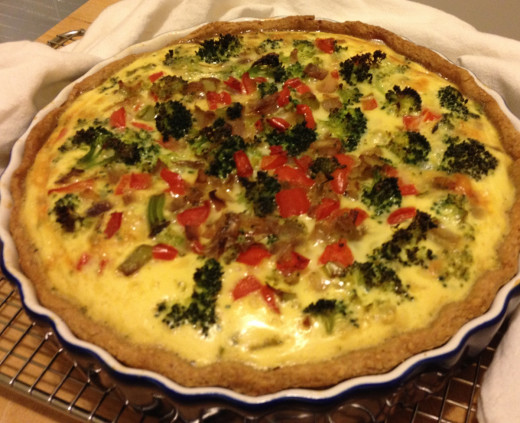 Broccoli and red pepper quiche in cobalt blue quiche pan