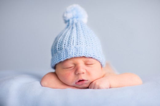 Of course, the best gift of all is the baby, but you can also get your friend a cute little hat!