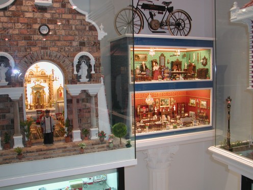 Some Doll's Houses Interiors and a miniature Church 