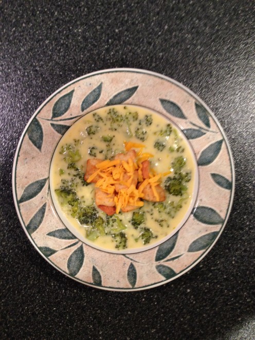 Thick and creamy cheddar broccoli soup  topped with garlic croutons and additional shredded cheddar cheese.