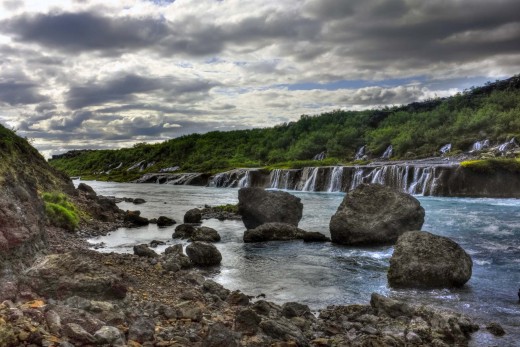 Hraunfossar - the Hraun rapids. Saga-land - e. Find them close to the Hallmundarhraun, near the Langjokull glacier in western Iceland, 