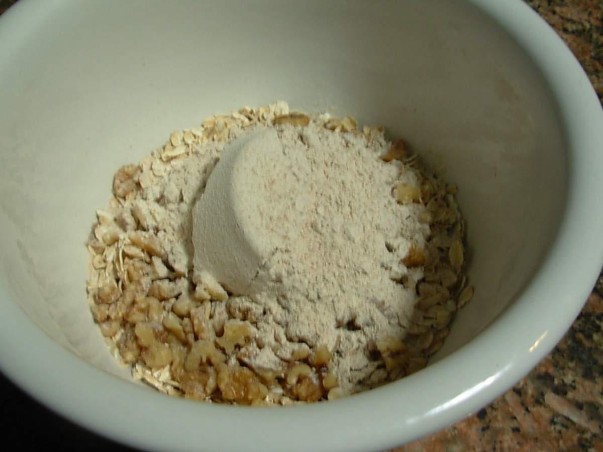The oats, flour, and walnuts will be mixed together in a bowl.