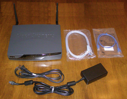 Make sure you get a power supply with yours, a console cable is nice too!   I got full power supply, a patch cable, a roll-over cable, and the two antennae, for 115 dollars from eBay.  NEW ONES in the box with plastic go for 155 dollars and up.