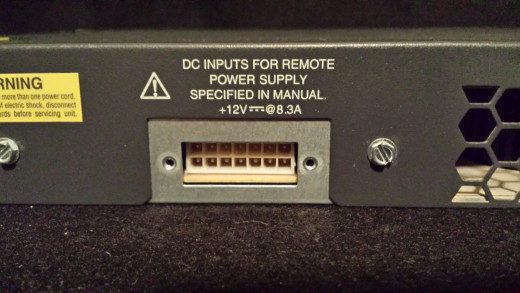 This is the power connection coupling jack, for the remote power supply.  But normally we use the 120v socket and grounded cord.