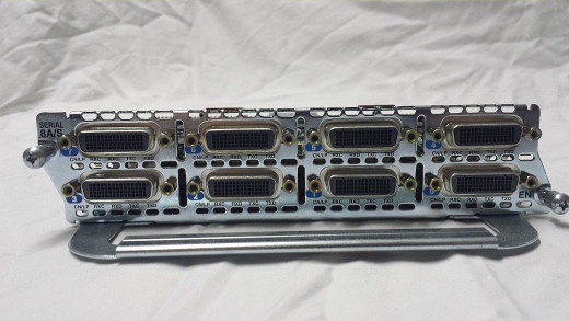 8 serial ports in this module, to create your Frame-Switching fabric.  Slide one of these babies in for connectivity. Routing IS as Routing DOES.