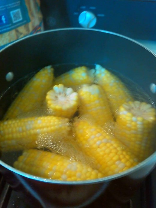 Corn on the cob.  Boil then rub them on heavily buttered bread and sprinkle with salt.