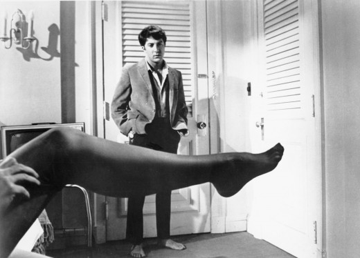 Older woman, Mrs. Robinson (Anne Bancroft) puts on her stockings after a fight with her lover, Benjamin (Dustin Hoffman.)