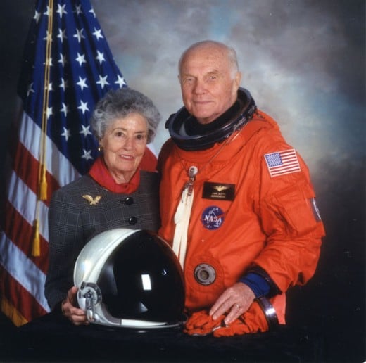 Color formal portrait of Annie Glenn and John Glenn in his spacesuit as a crew member on the Space Shuttle Discovery mission STS-95, 1998.