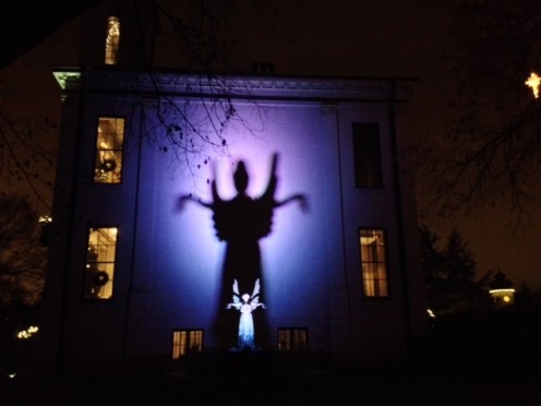 Reflection of an angel, and lights. An amazing shadow is cast!