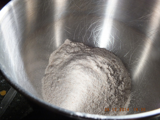 I placed every ingredient in the large mixing stand bowl needed for the bread flour.