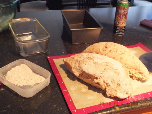 I just cut the dough in half and will do a light shaping so it fits in my loaf pans.