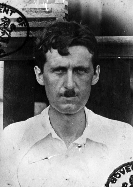 A passport photo showing George Orwell during his time in Burma