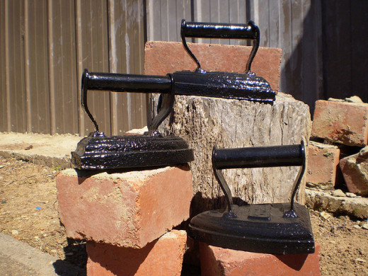 These irons have been in my family for generations.  Just a bit of  arranging on bricks in the sun and wala! another image for my shop.