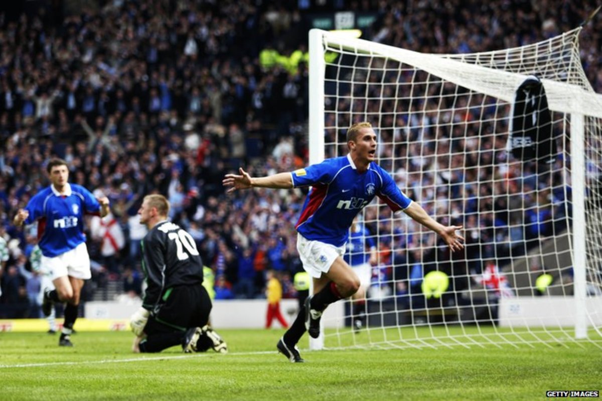 Peter Løvenkrands streches his arms in celebration after scoring the winning goal for Rangers against Celtic in the 2002 Scottish Cup final.