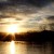 I love this picture of the Sun over the lake, with birds in the sky and geese on the water.  It is so bright and beautiful.