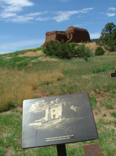 Approach the ruins of the Spanish Mission from the visitor center and you will find a depiction of what the mission looked like when it was active at Pecos National Historical Park near Santa Fe, New Mexico.