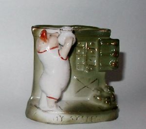 Rare. Piggy pouring something from a vase into a cabinet I believe. Sold for $55. Rare. Piggy pouring something from a vase into a cabinet I believe. Sold for $55.